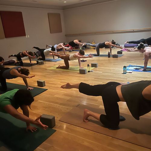 posing in hot yoga class